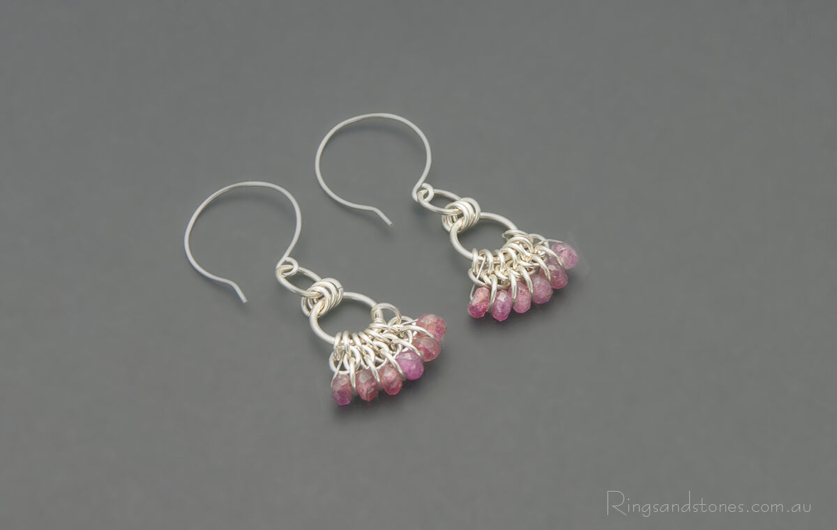 Sterling silver chainmaille fan earrings with pink tourmaline gemstones.