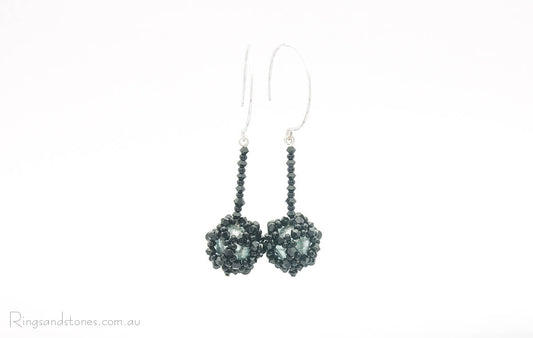 Beaded black earrings with shiny Swarovski crystals and silver Murano glass