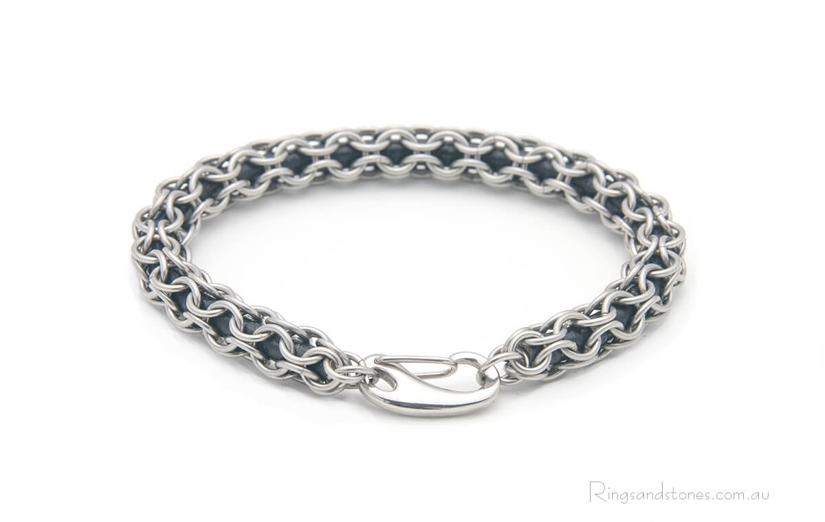 Unique stainless steel bracelet with captured leather gothic style