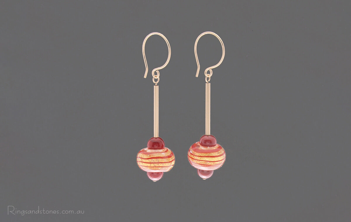 Red and gold swirly stripe beaded long earrings