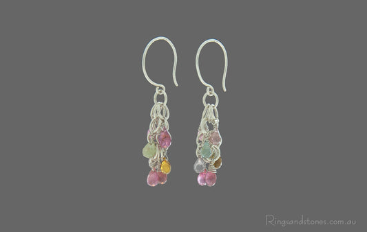 Sterling silver long earrings with wire wrapped small tourmaline gemstones in vivid colours.