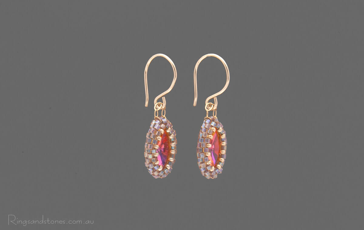 Hand hand beaded earrings with Swarovski crystals