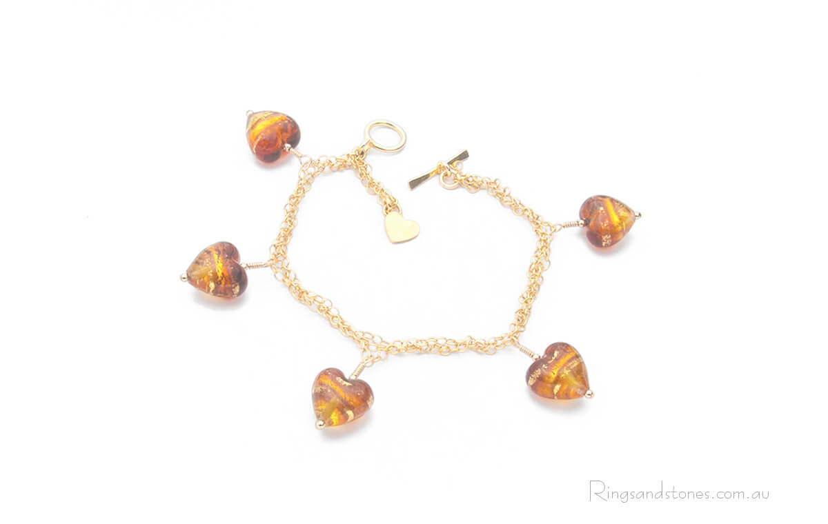Gold chain charm bracelet with gold hearts bead charms