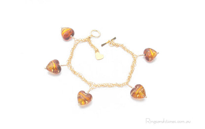 Gold chain charm bracelet with gold hearts bead charms