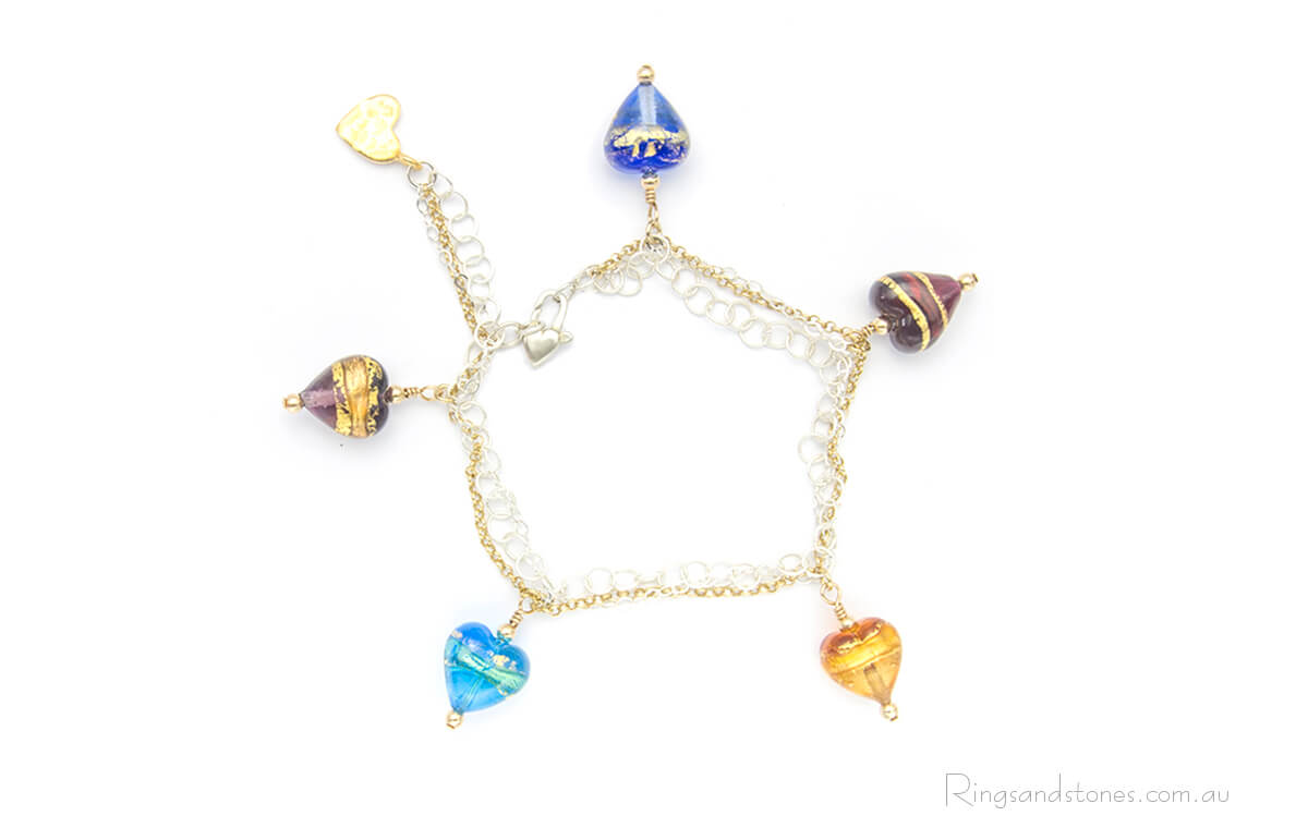 Bracelet gold and silver chains with Murano glass hearts